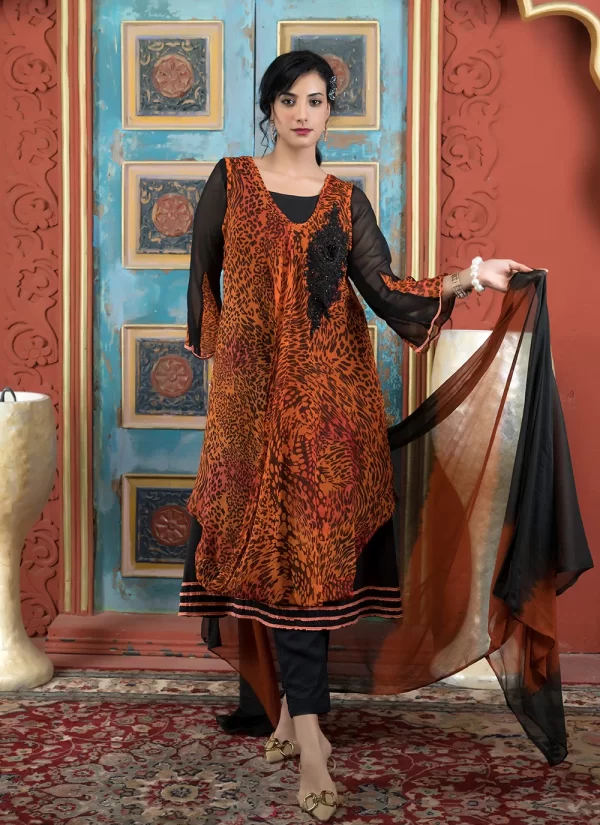 Snazzy Rust Georgette Pant Style Suit
