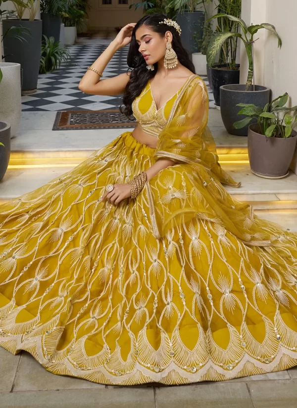 Yellow Embroidered, Sequins and Thread Work Net Lehenga Choli
