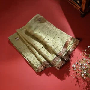 Discover the elegance of our Lime Green Silk Dupatta, adorned with intricate Gota floral booties and CoutureCraze lace. Perfect for weddings and festive occasions, this piece adds vibrant charm to any outfit.