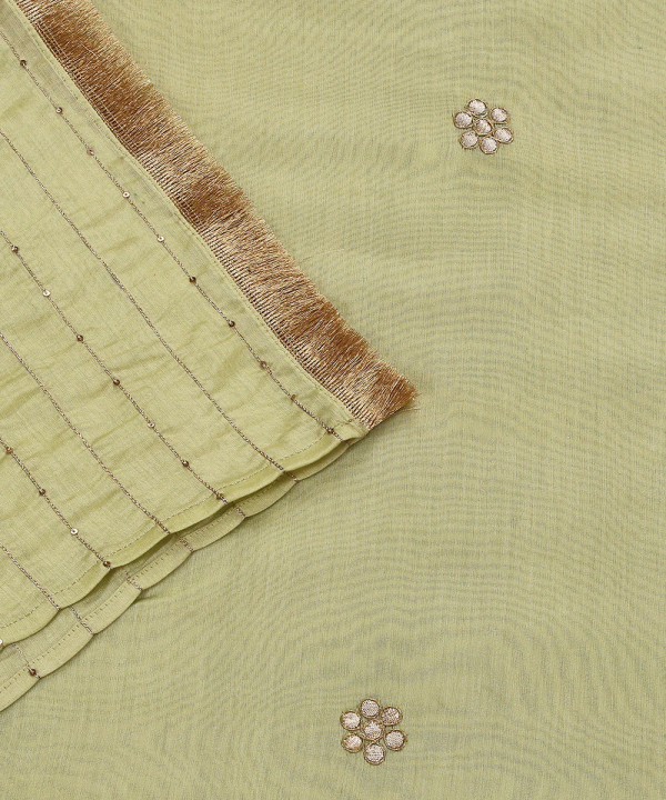 Discover the elegance of our Lime Green Silk Dupatta, adorned with intricate Gota floral booties and CoutureCraze lace. Perfect for weddings and festive occasions, this piece adds vibrant charm to any outfit.