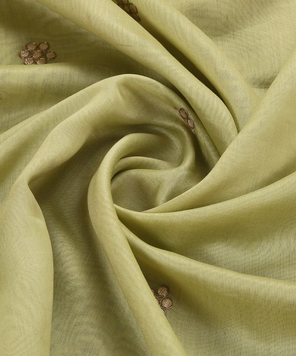 Discover the elegance of our Lime Green Silk Dupatta, adorned with intricate Gota floral booties and CoutureCraze lace. Perfect for weddings and festive occasions, this piece adds vibrant charm to any outfit.