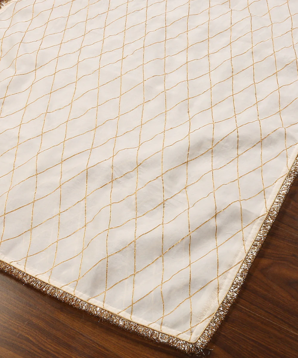Elevate your ethnic look with our White Organza Dupatta featuring exquisite gota work. Perfect for weddings and festive occasions, this elegant piece adds sophistication to any outfit couturecraze .
