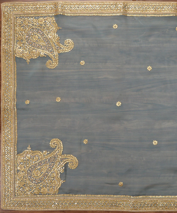 Elegant Sea Blue Handloom Organza Dupatta with Gota Patti Work – A beautifully crafted traditional dupatta with intricate gota patti embroidery on a soft organza base. Perfect for weddings, festive occasions, and traditional wear, this dupatta combines luxury with timeless charm. Sea Blue Handloom Zardozi Organza Dupatta