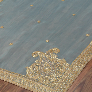 Elegant Sea Blue Handloom Organza Dupatta with Gota Patti Work – A beautifully crafted traditional dupatta with intricate gota patti embroidery on a soft organza base. Perfect for weddings, festive occasions, and traditional wear, this dupatta combines luxury with timeless charm. Sea Blue Handloom Zardozi Organza Dupatta