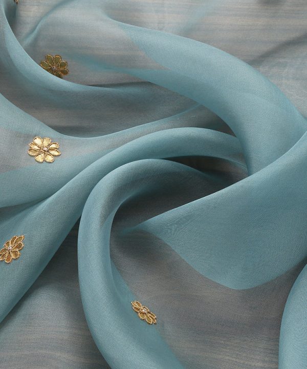 Elegant Sea Blue Handloom Organza Dupatta with Gota Patti Work – A beautifully crafted traditional dupatta with intricate gota patti embroidery on a soft organza base. Perfect for weddings, festive occasions, and traditional wear, this dupatta combines luxury with timeless charm. Sea Blue Handloom Zardozi Organza Dupatta