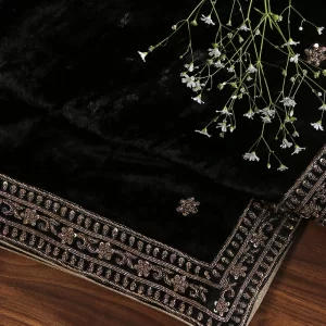 Discover the elegance of our Black Velvet Dupatta featuring intricate zardozi hand-embroidered borders by CoutureCraze. A luxurious addition to your festive wardrobe.