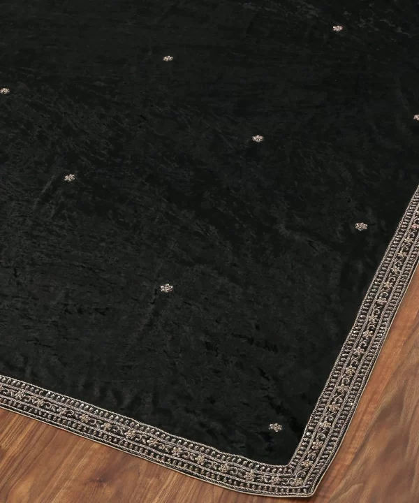Discover the elegance of our Black Velvet Dupatta featuring intricate zardozi hand-embroidered borders by CoutureCraze. A luxurious addition to your festive wardrobe.