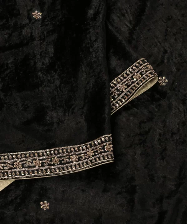 Discover the elegance of our Black Velvet Dupatta featuring intricate zardozi hand-embroidered borders by CoutureCraze. A luxurious addition to your festive wardrobe.
