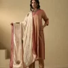 Elegant off-white velvet doshala with intricate zardozi embroidery and contrast Chanderi tissue border. Perfect for weddings and festive events, adding timeless luxury. by couturecraze