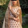 CoutureCraze blush pink gold embroidered lehenga set with star motifs and heavy threadwork