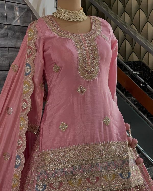 Pink embroidered blouse with gold thread work and traditional motifs