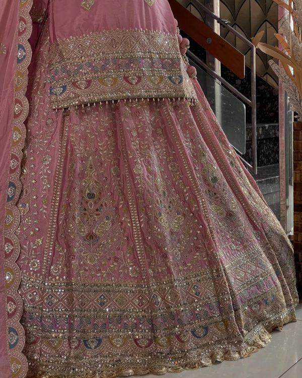 Heavy gold embroidery and sequin work on pink bridal lehenga skirt