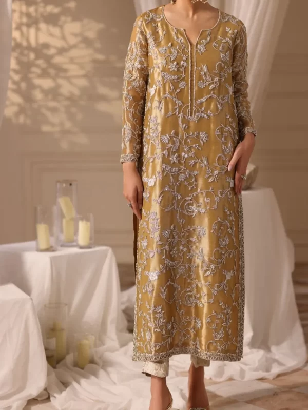 Luxury golden ethnic dress for women, featuring silver floral hand embroidery, full sleeves, and straight fit, ideal for festive occasions.