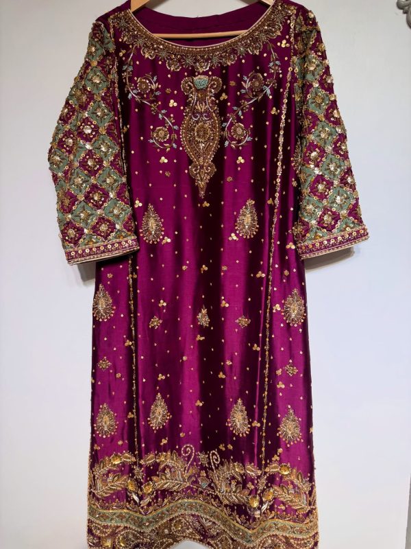 Luxury maroon ethnic dress with gold and silver hand embroidery, flared cut, CoutureCraze 2025.