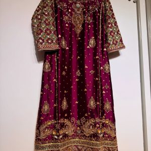 Luxury maroon ethnic dress with gold and silver hand embroidery, flared cut, CoutureCraze 2025.