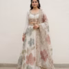 Luxury pastel floral embroidered lehenga set in ivory with blouse and dupatta, CoutureCraze 2025.