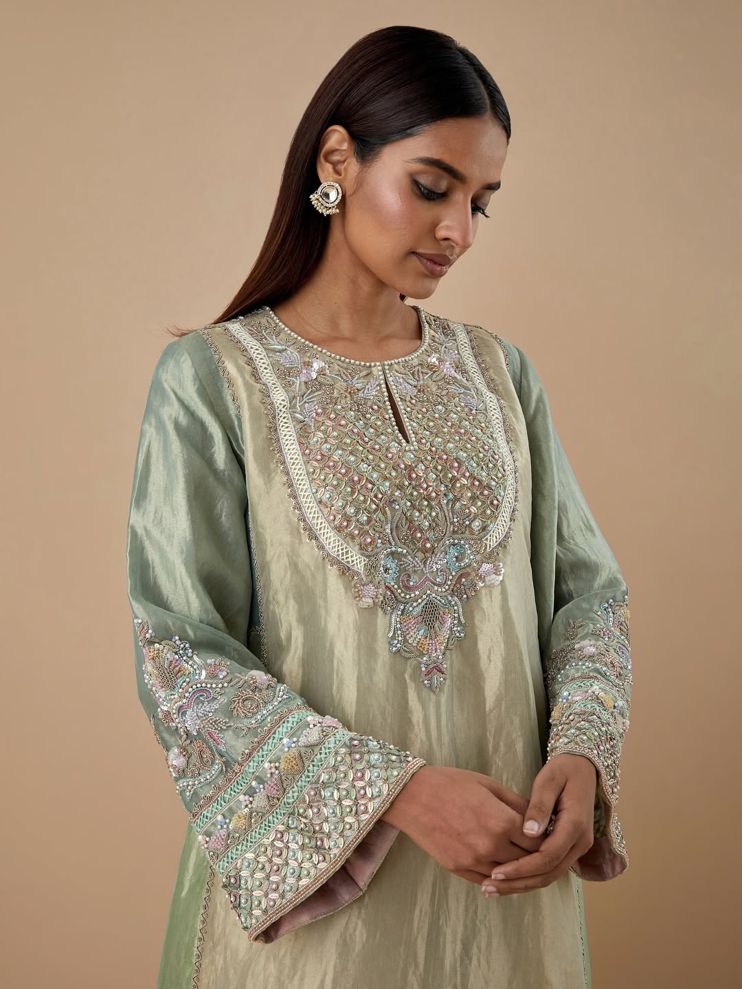 Mint green embroidered kurta with pastel beads and detailed sleeves from CoutureCraze