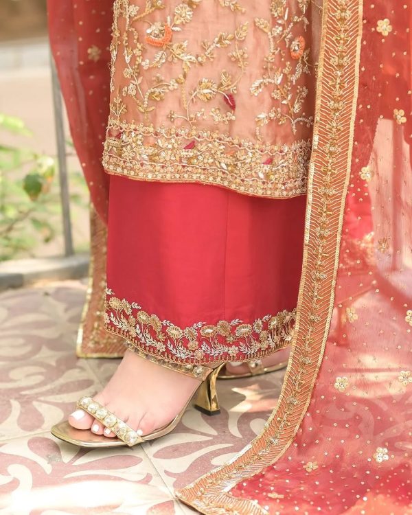 CoutureCraze peach gold embroidered suit set with red dupatta and detailed golden threadwork