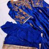 Royal blue silk kurta with intricate gold embroidery, paired with matching bottoms and a gold-bordered dupatta