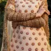 CoutureCraze blush pink gold embroidered lehenga set with star motifs and heavy threadwork