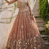 Ethnic peach lehenga set with fitted chanderi blouse and embroidered organza dupatta from Couturecraze
