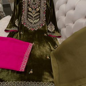Olive green velvet suit with hand embroidered French velvet shirt, raw silk trousers and organza dupatta