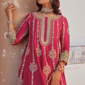 Close up marori embroidery on berry magenta kurta