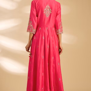 Back view of strawberry red spun silk kurta set