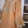 Golden Anarkali suit with intricate embroidery and dupatta